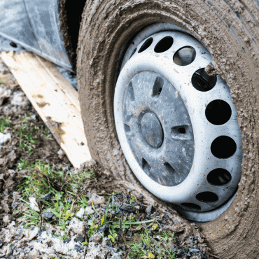 Norma Jean Client with a vehicle stuck in the mud